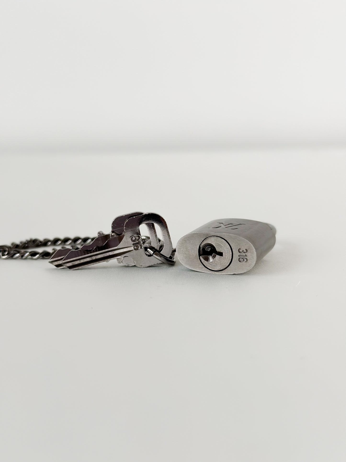 Louis Vuitton Brushed Titanium Padlock Set 316