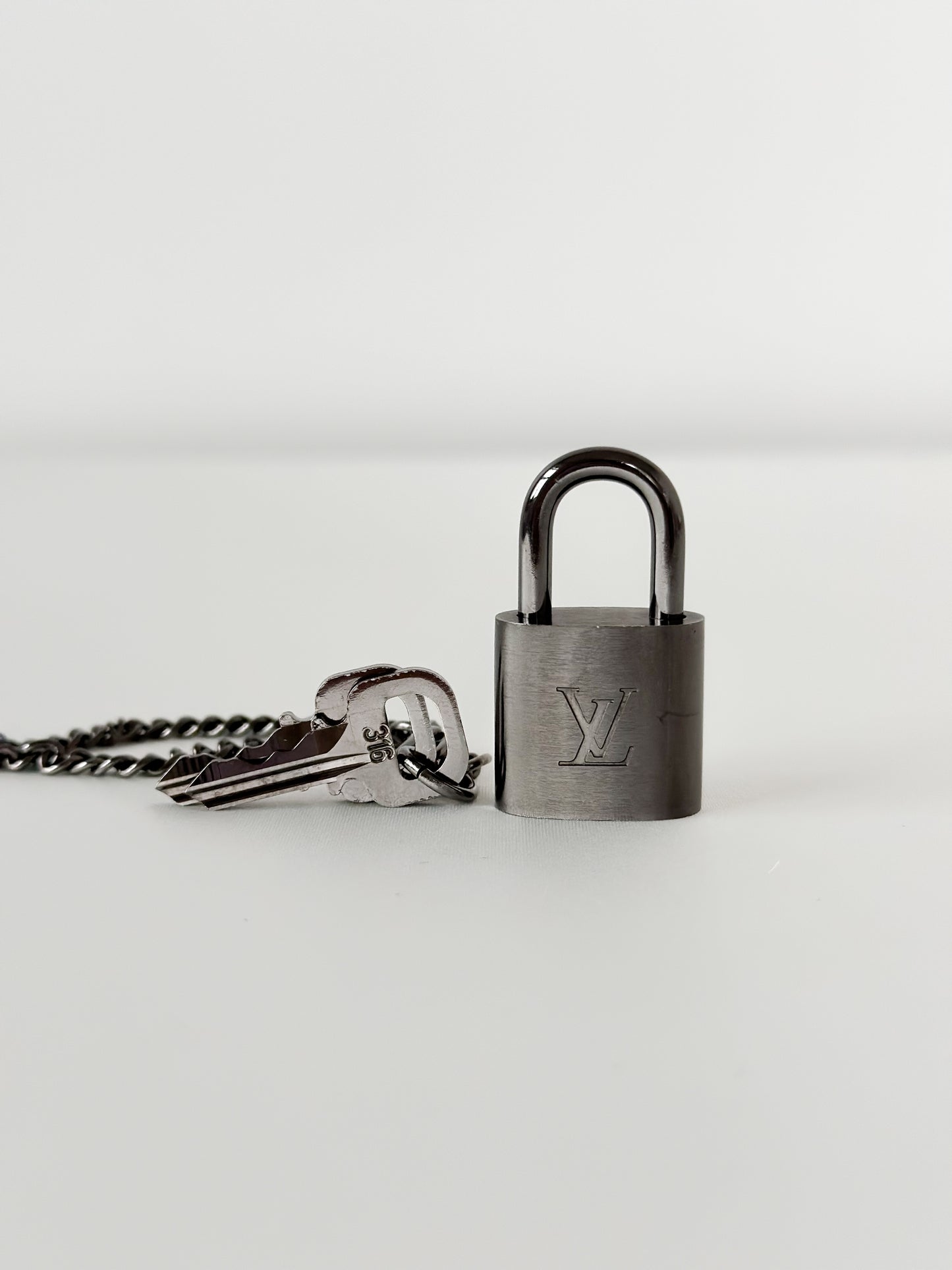 Louis Vuitton Brushed Titanium Padlock Set 316