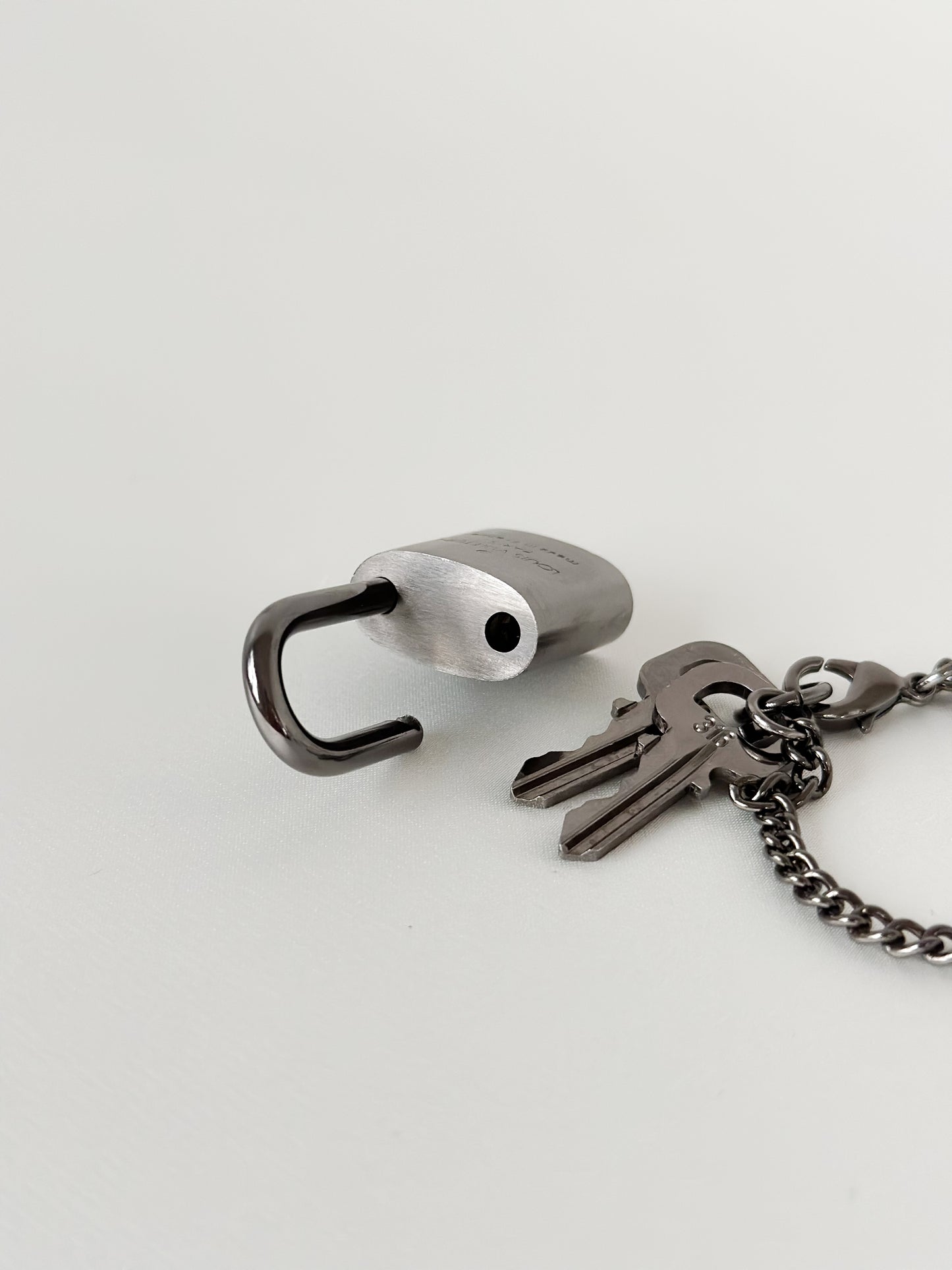 Louis Vuitton Brushed Titanium Padlock Set 316