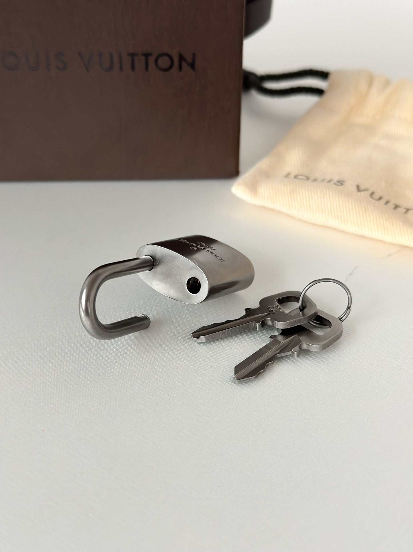 Louis Vuitton Silver Padlock 321 Matte