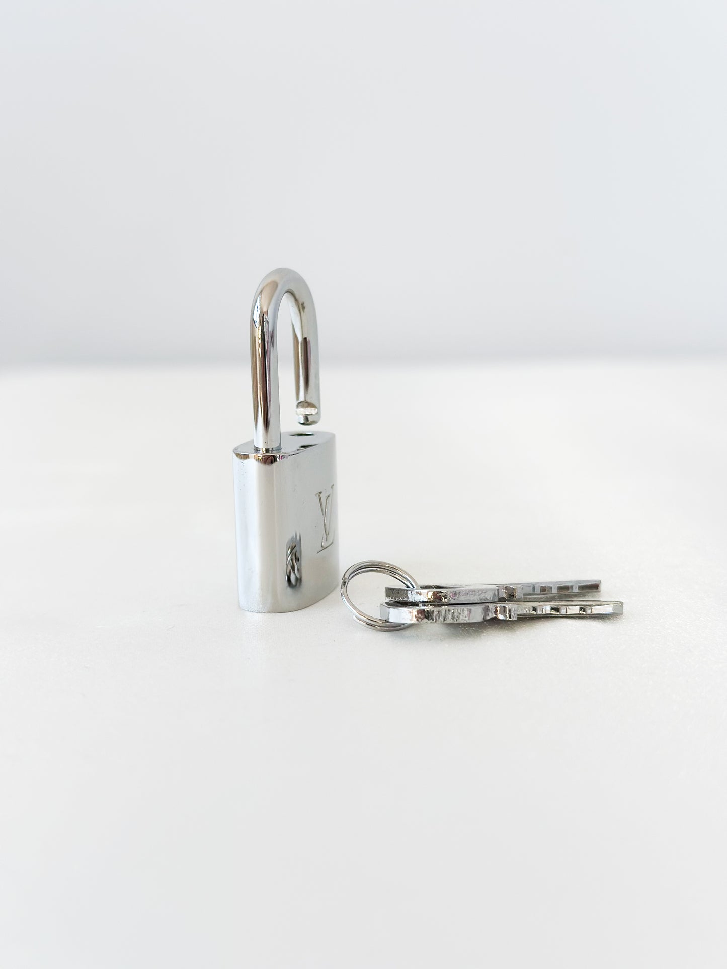 Louis Vuitton Silver Padlock 438