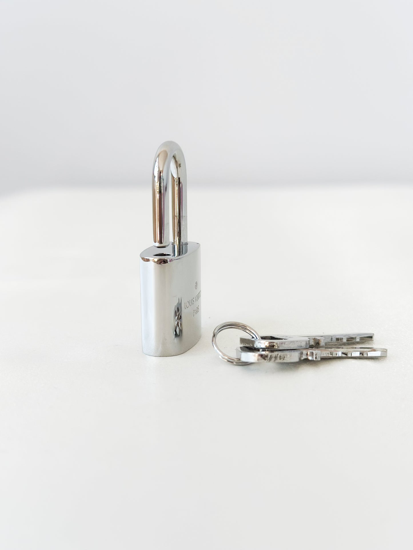 Louis Vuitton Silver Padlock 438