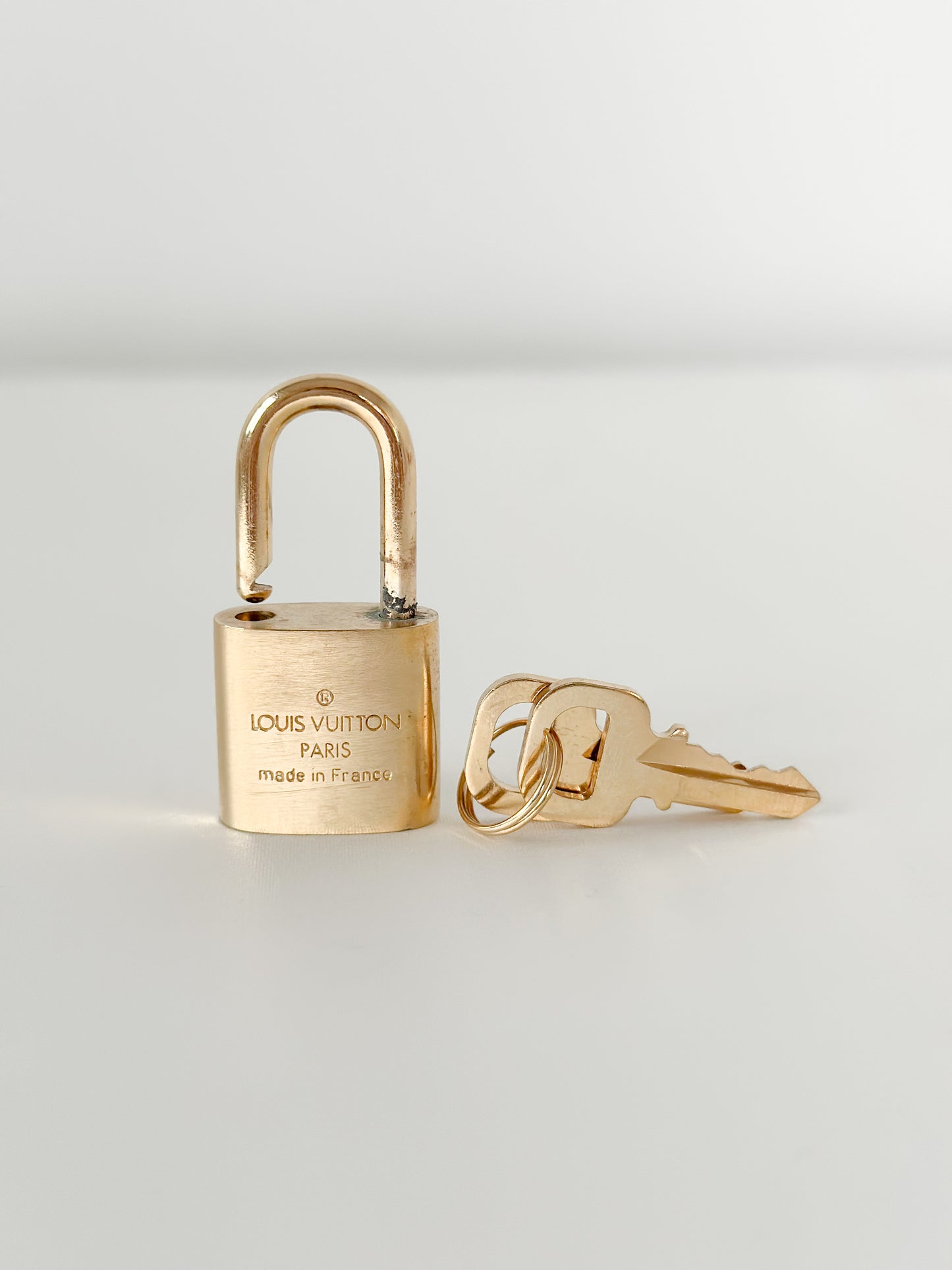 Louis Vuitton Brushed Brass Padlock Set 306