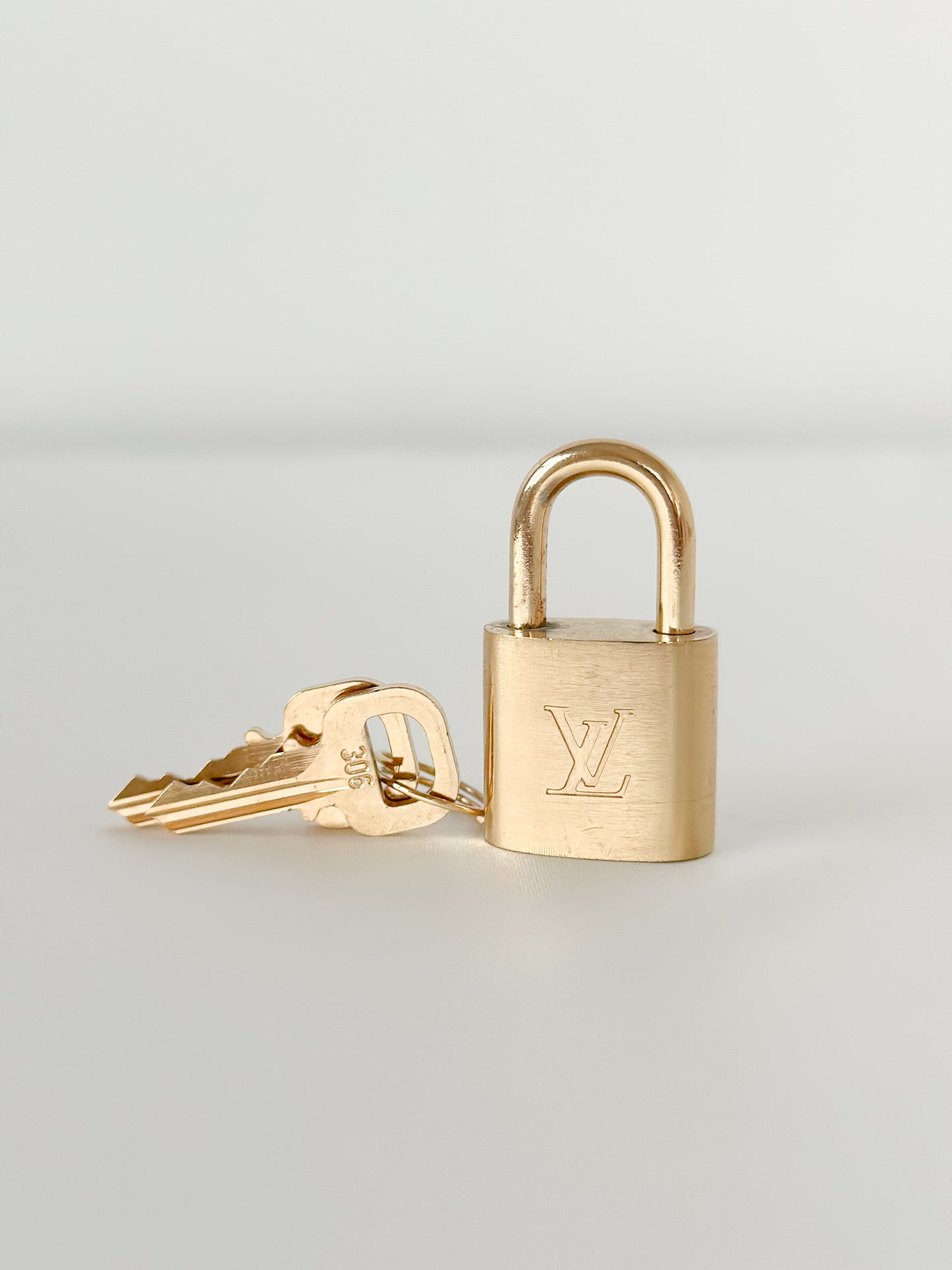 Louis Vuitton Brushed Brass Padlock Set 306