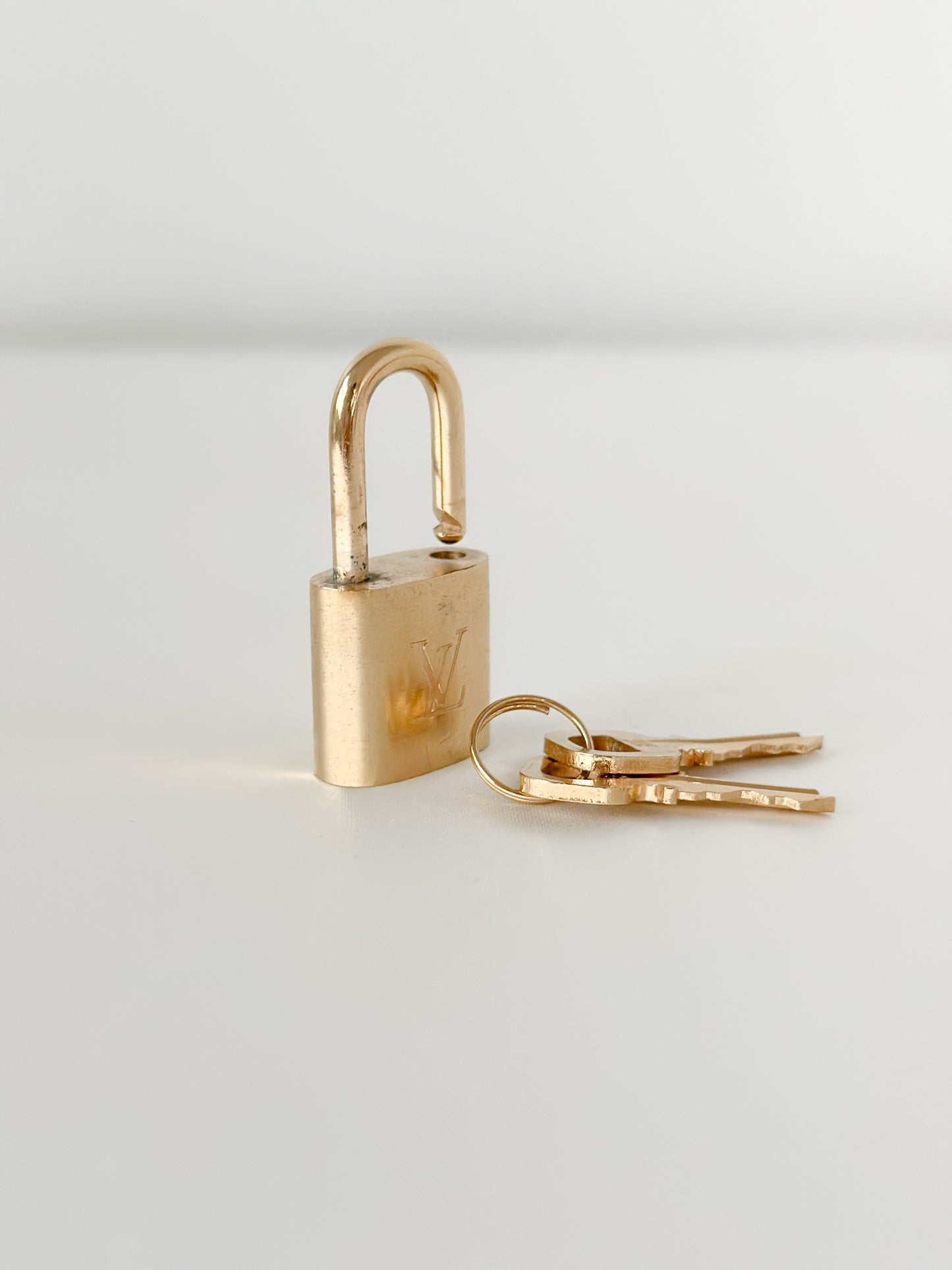 Louis Vuitton Brushed Brass Padlock Set 306