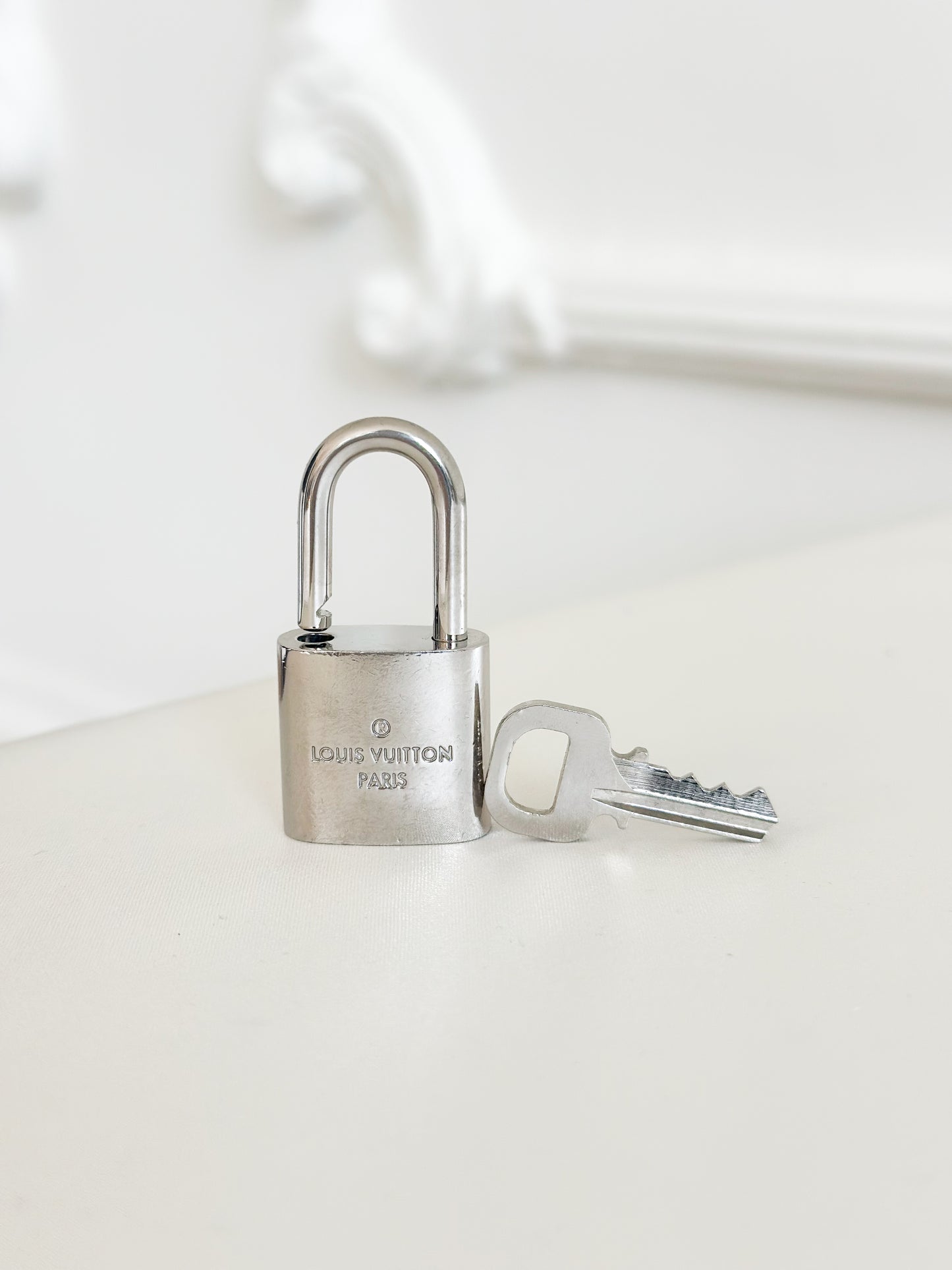 Louis Vuitton Silver Padlock 434