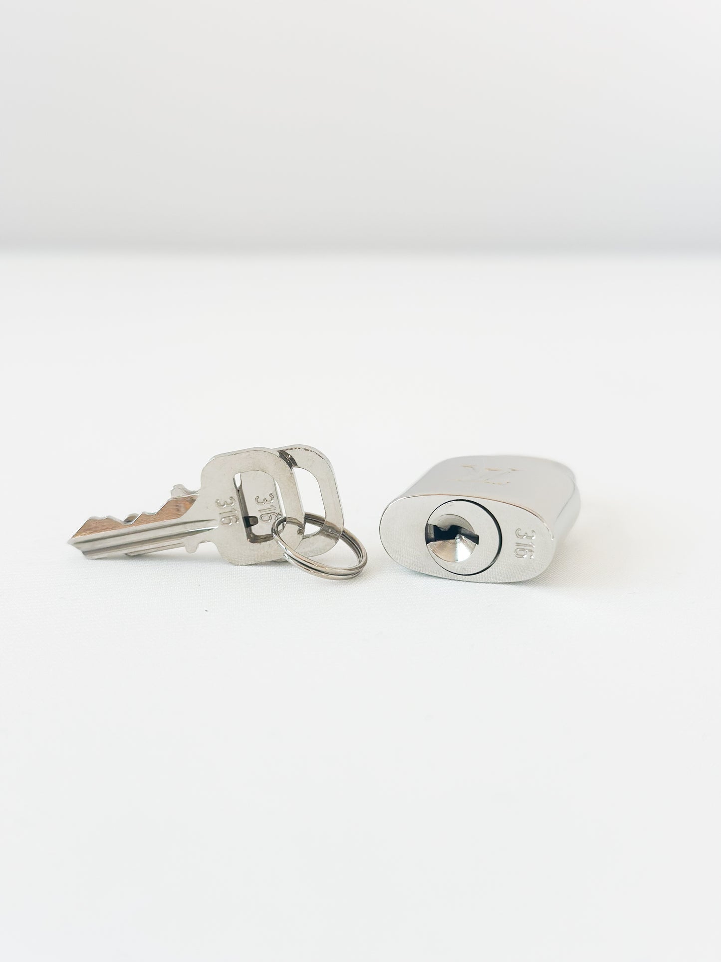 Louis Vuitton Silver Padlock 316 - 2 Keys