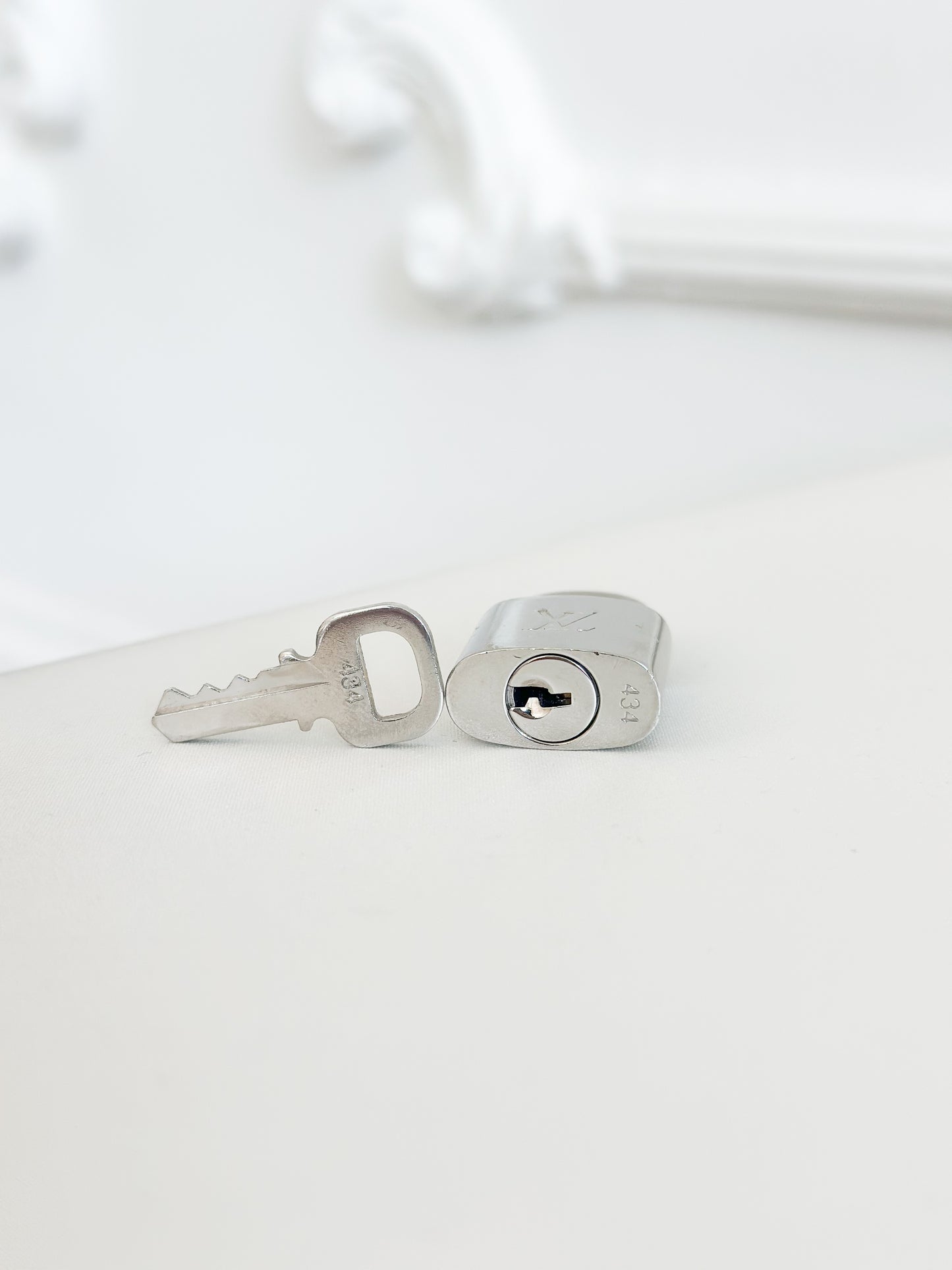 Louis Vuitton Silver Padlock 434