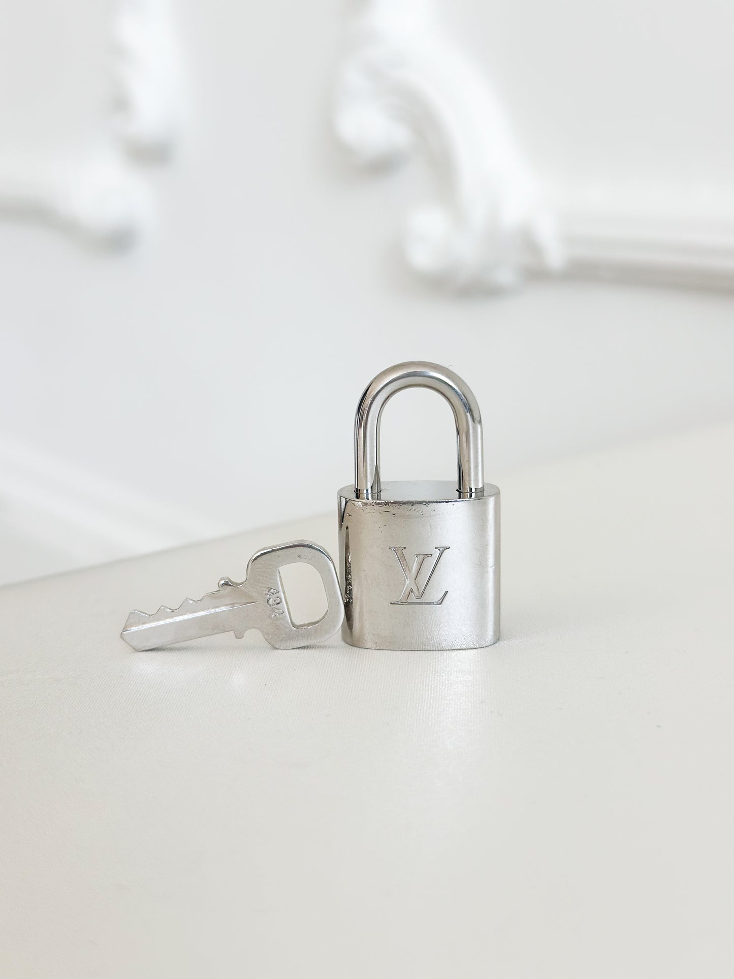 Louis Vuitton Silver Padlock 434