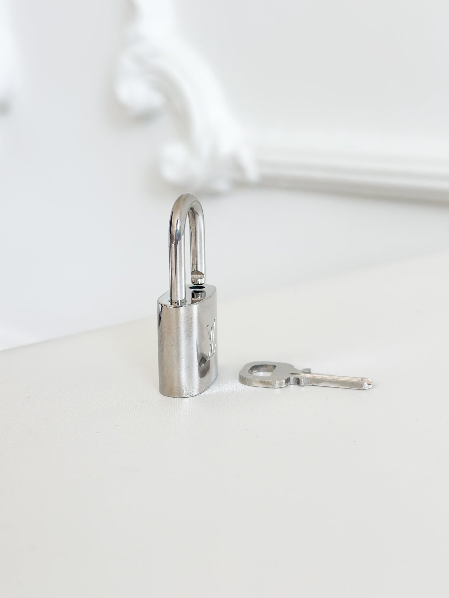 Louis Vuitton Silver Padlock 434