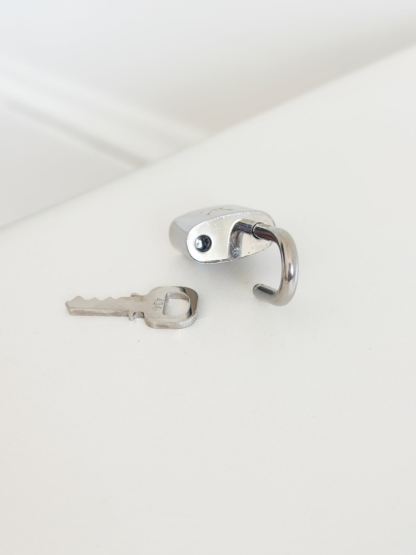 Louis Vuitton Silver Padlock 434